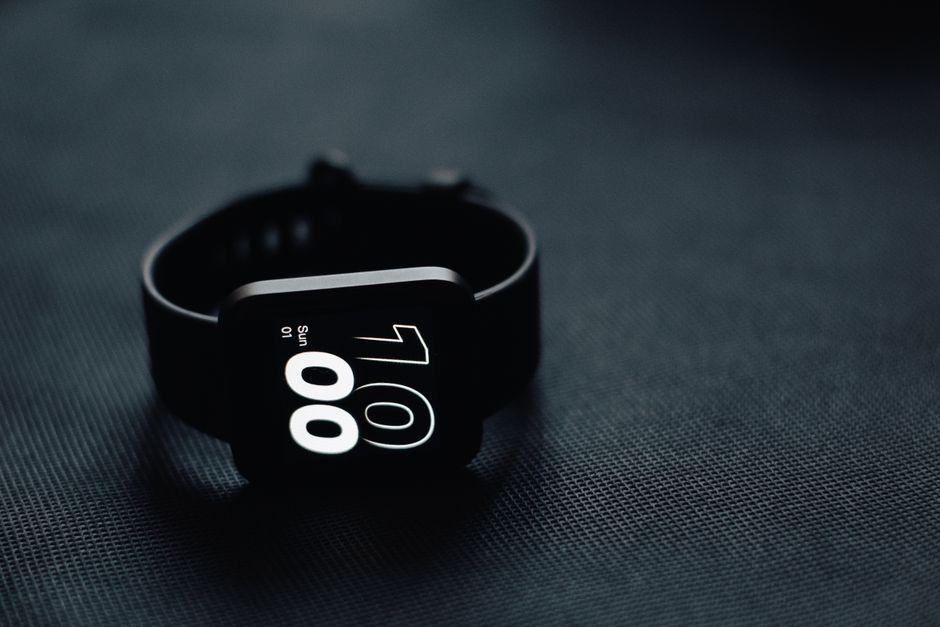An affordable smart ring resting on a desk