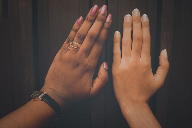 Two titanium smart rings shown side by side